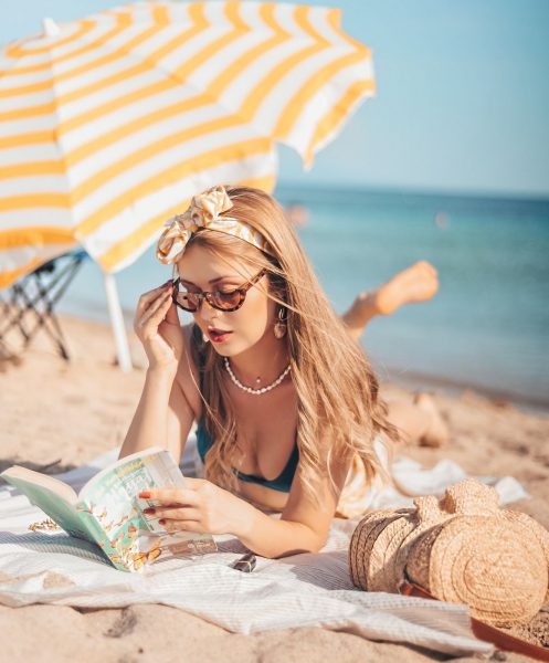 woman-reading-on-the-beach
